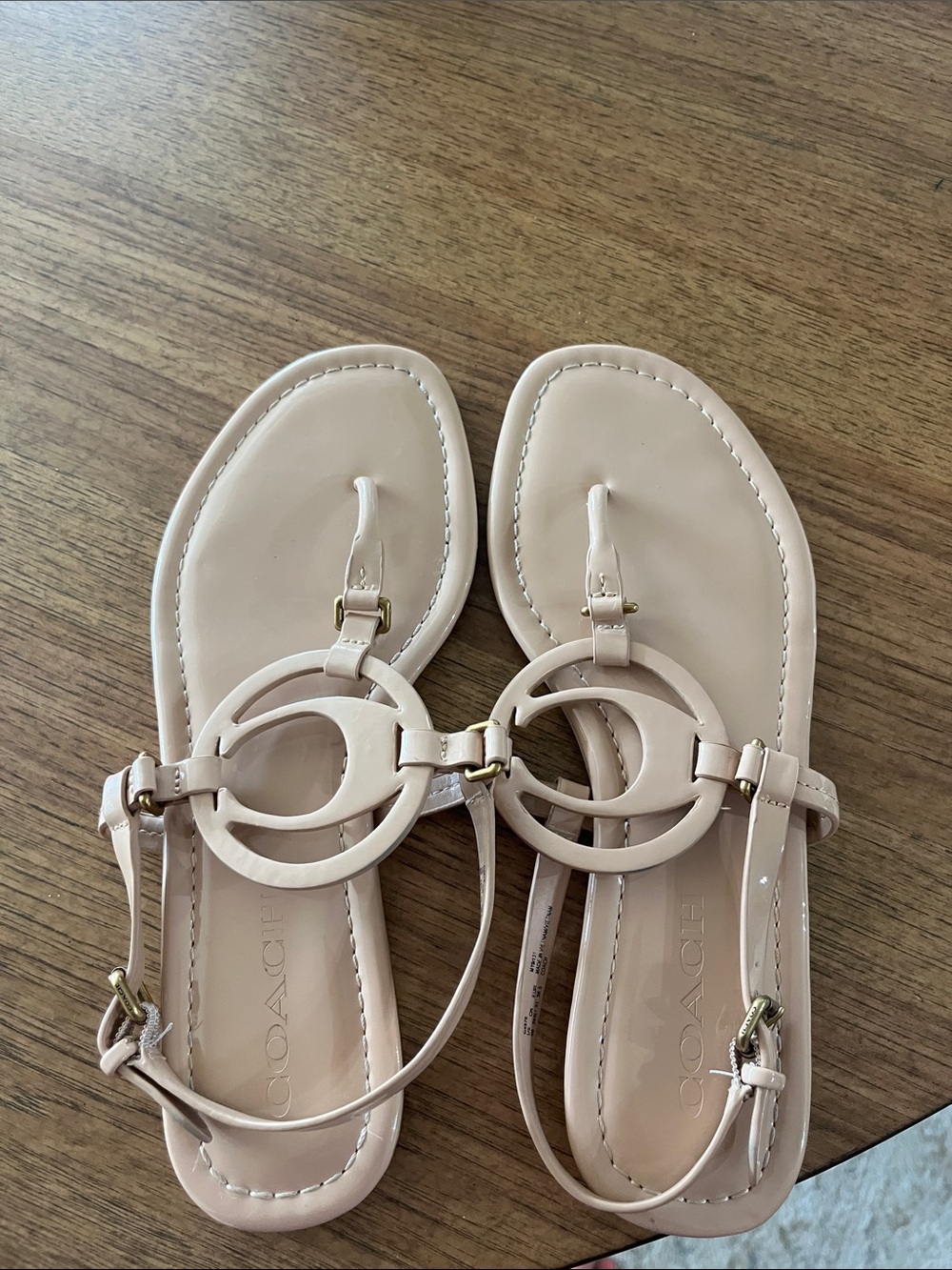 COACH Nude Patent Leather Circular Logo Thong Sandals